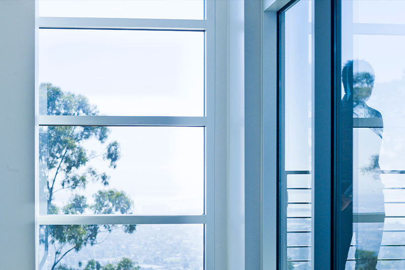 Image of window with human shadow. 